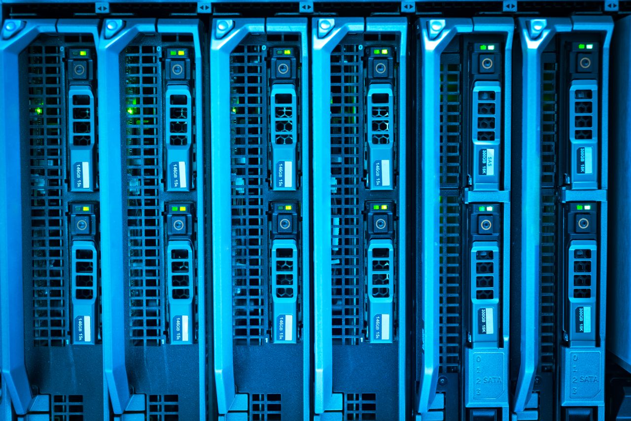 Offerings Detailed image of illuminated server racks showcasing modern technology infrastructure.